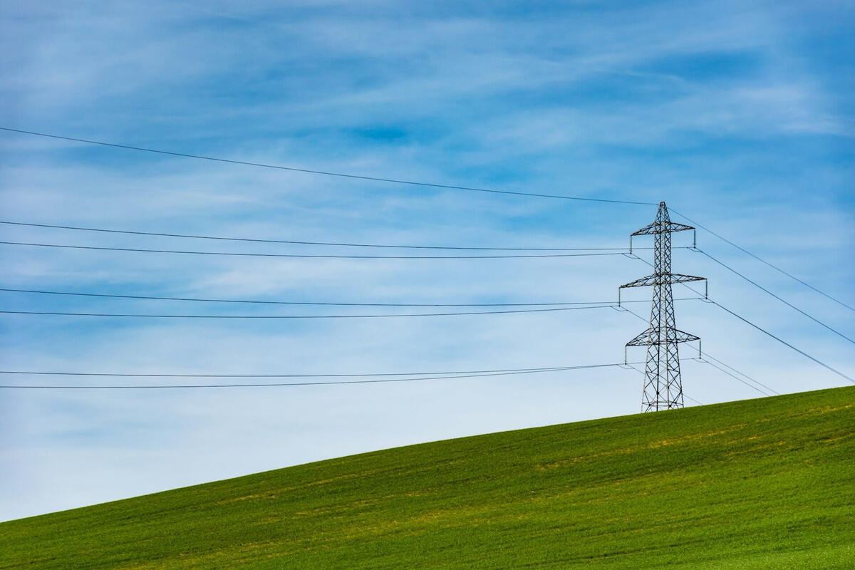 Power Grid Infrastructure High-voltage power transmission lines carrying electricity across an energy grid