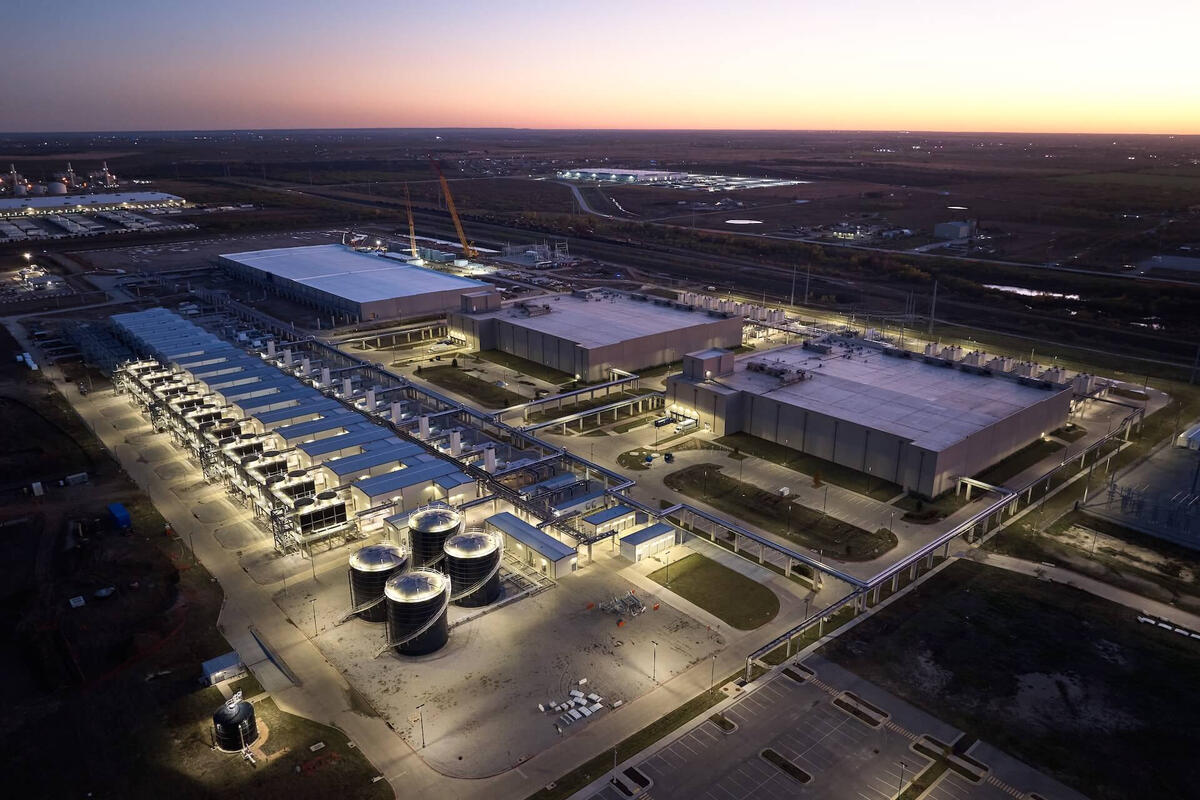 Aerial view of a large-scale data center campus and surrounding infrastructure